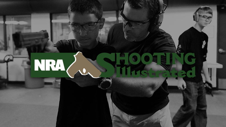 NRA Shooting Illustrated Logo on a Dark Background of a Gun Range